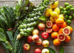 a group of fruits and vegetables on a wood surface Healthy Weight Loss Diets Rushden